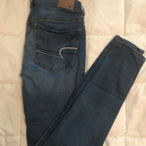 “super stretch” low rise jeans.